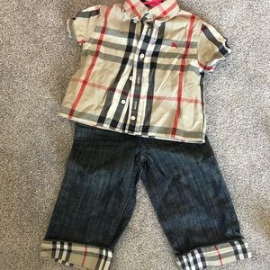 Burberry shirt and jeans.